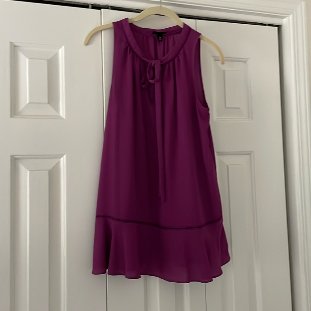 Massimo sleeveless ruffle bottom blouse